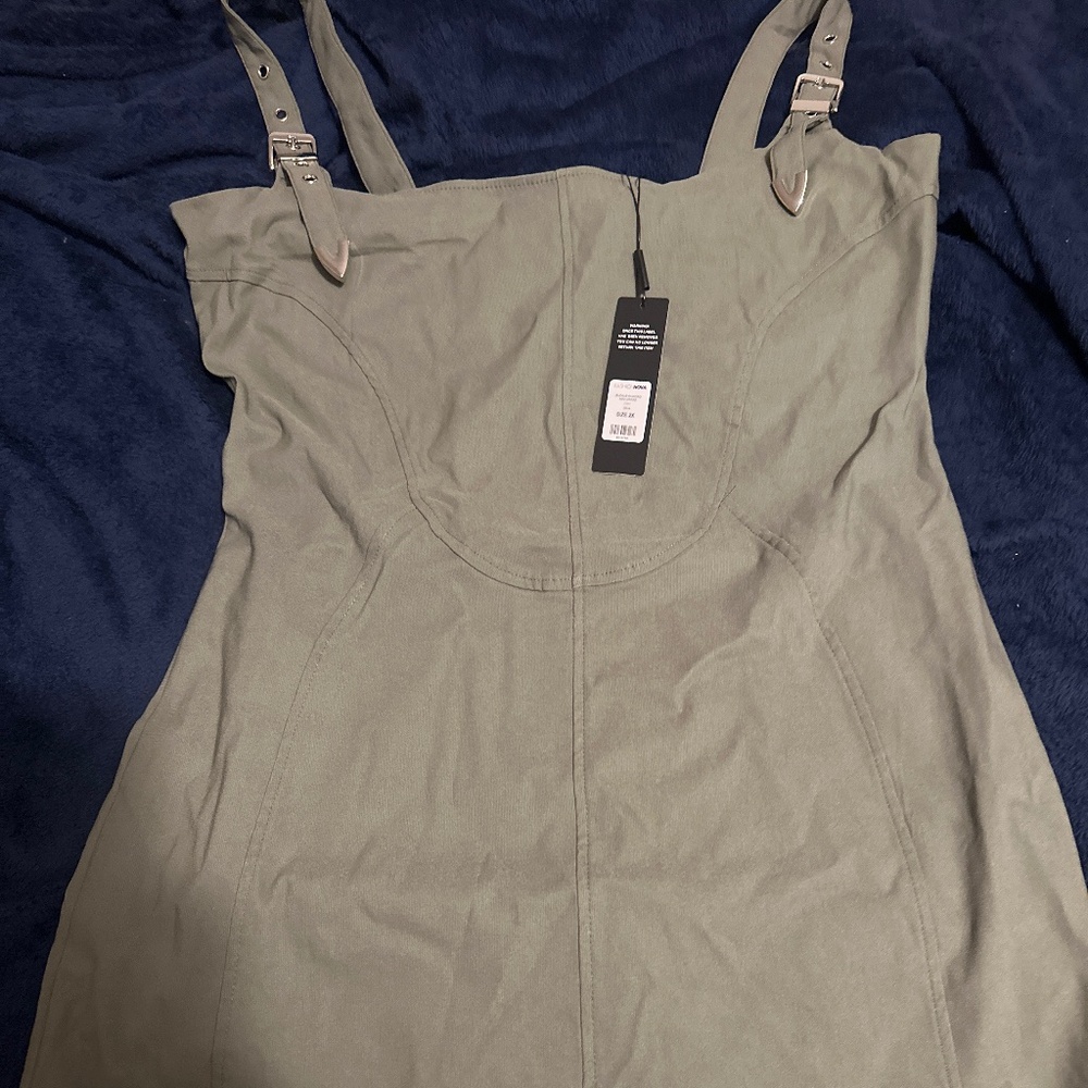 Olive buckle in micro mini dress